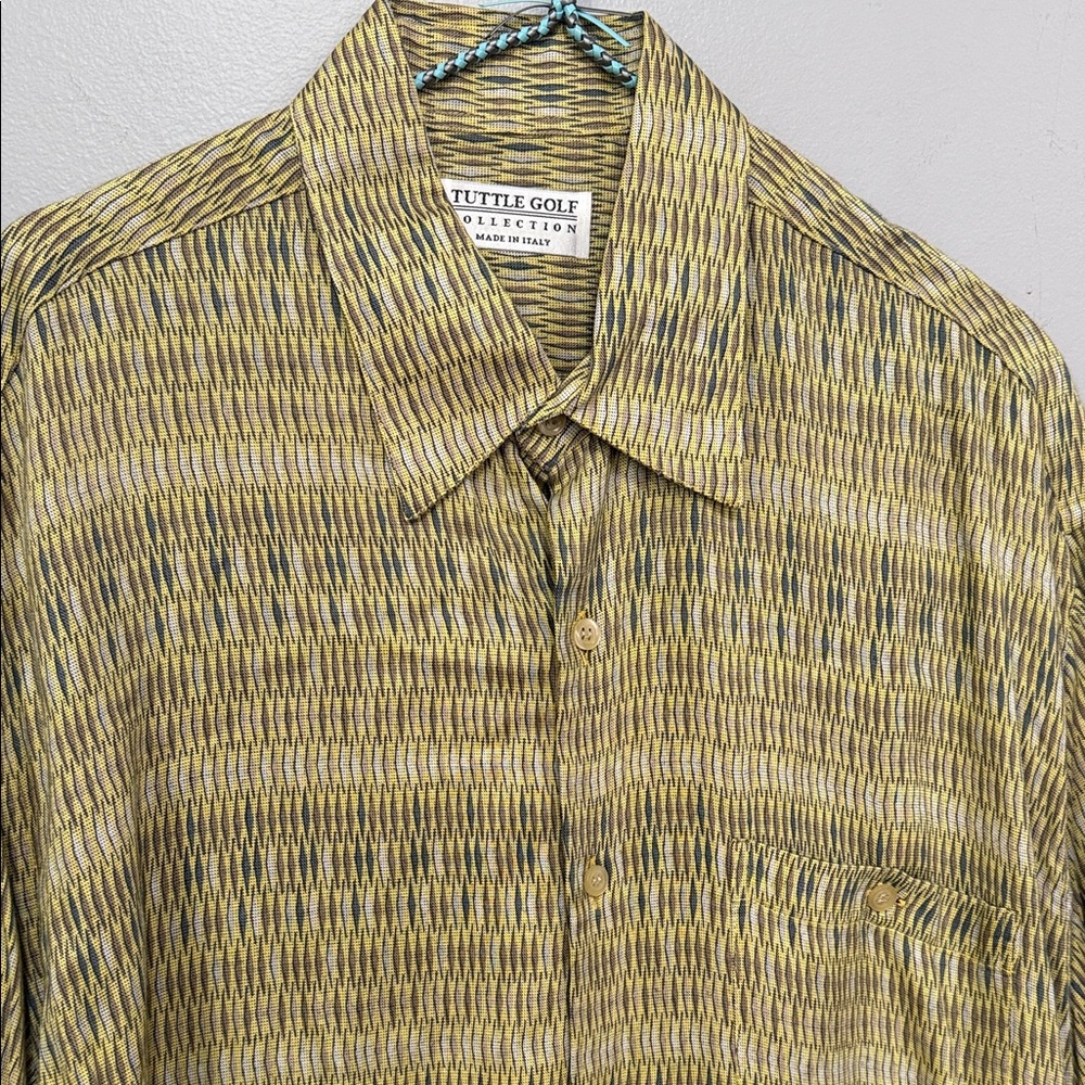 Tuttle golf collection shirt.
